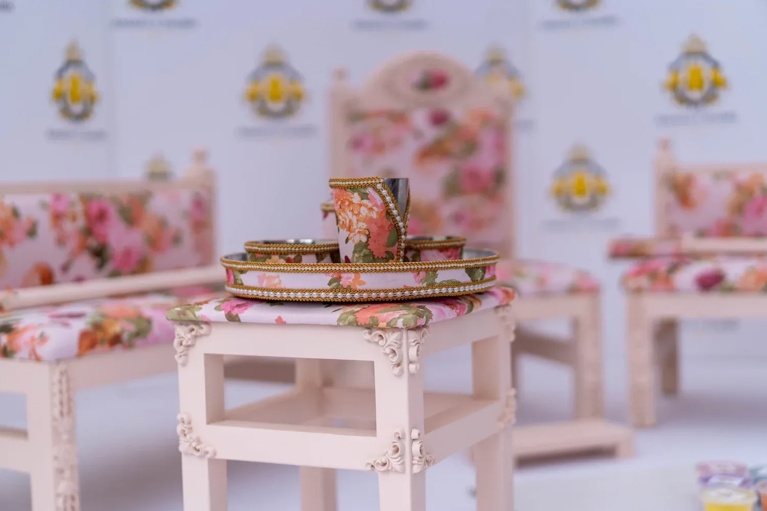 The Enchantress suite seen from an angle with the tray table dressed for the ceremony and the Phatti set in front.
